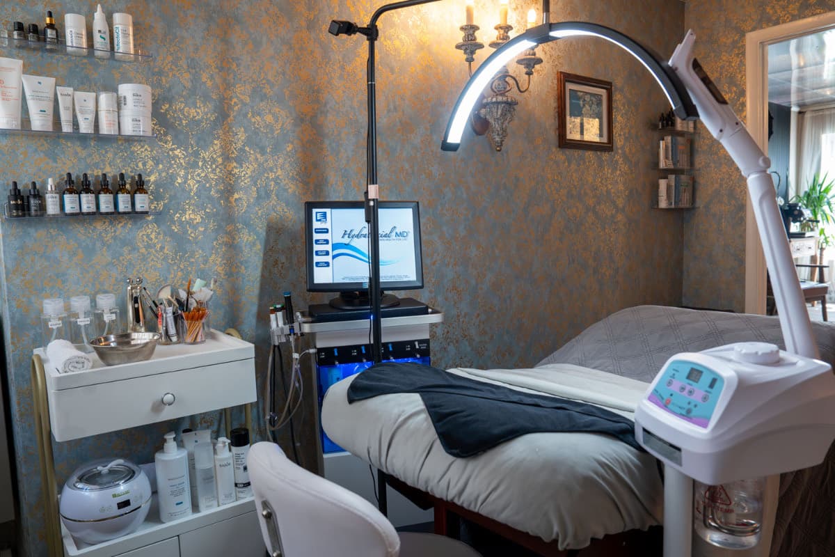 HydraFacial machine beside the treatment bed at LNO Boutique med spa in Centennial, near Denver