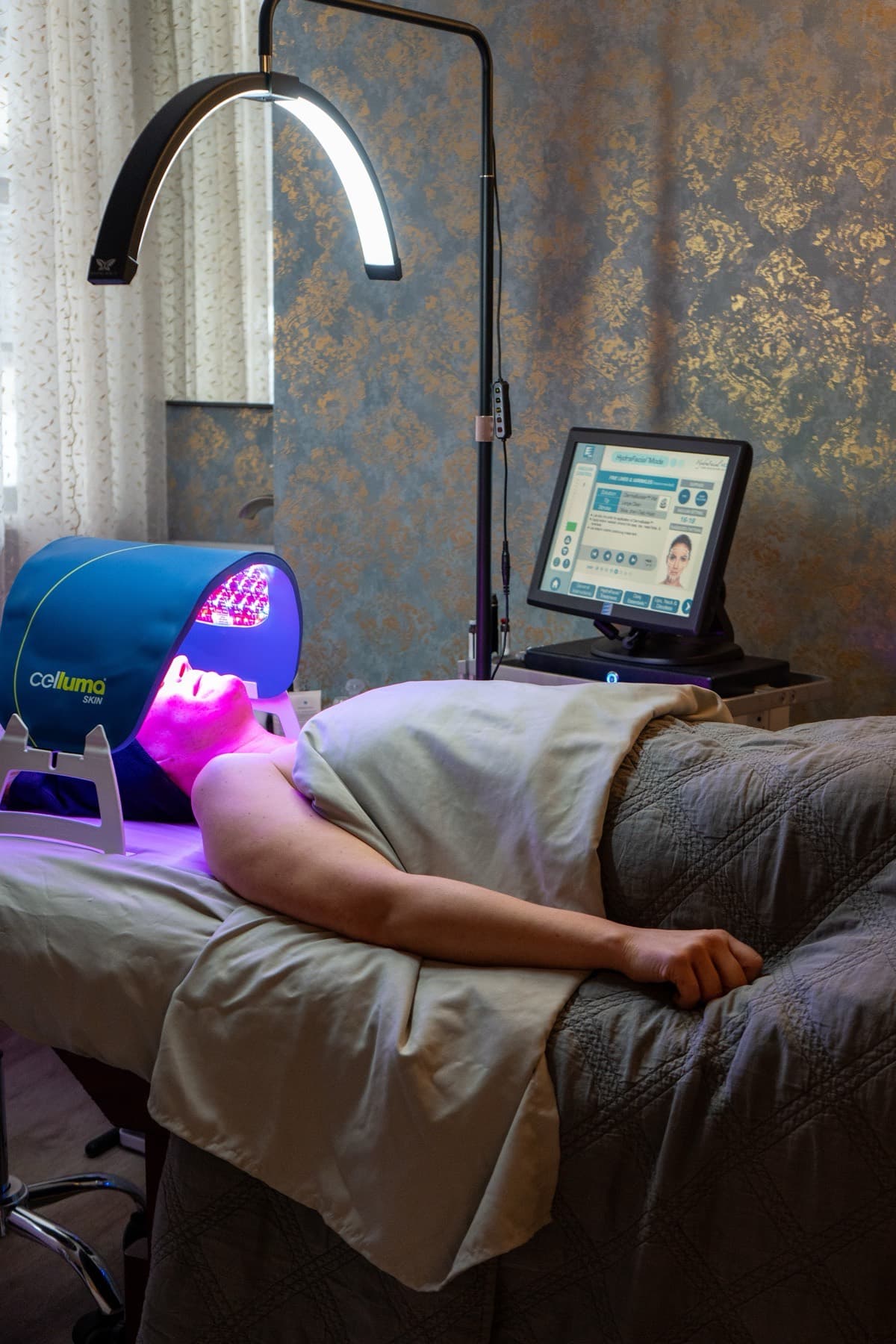 LED light therapy session in the facial treatment room at LNO Boutique med spa in Centennial, CO